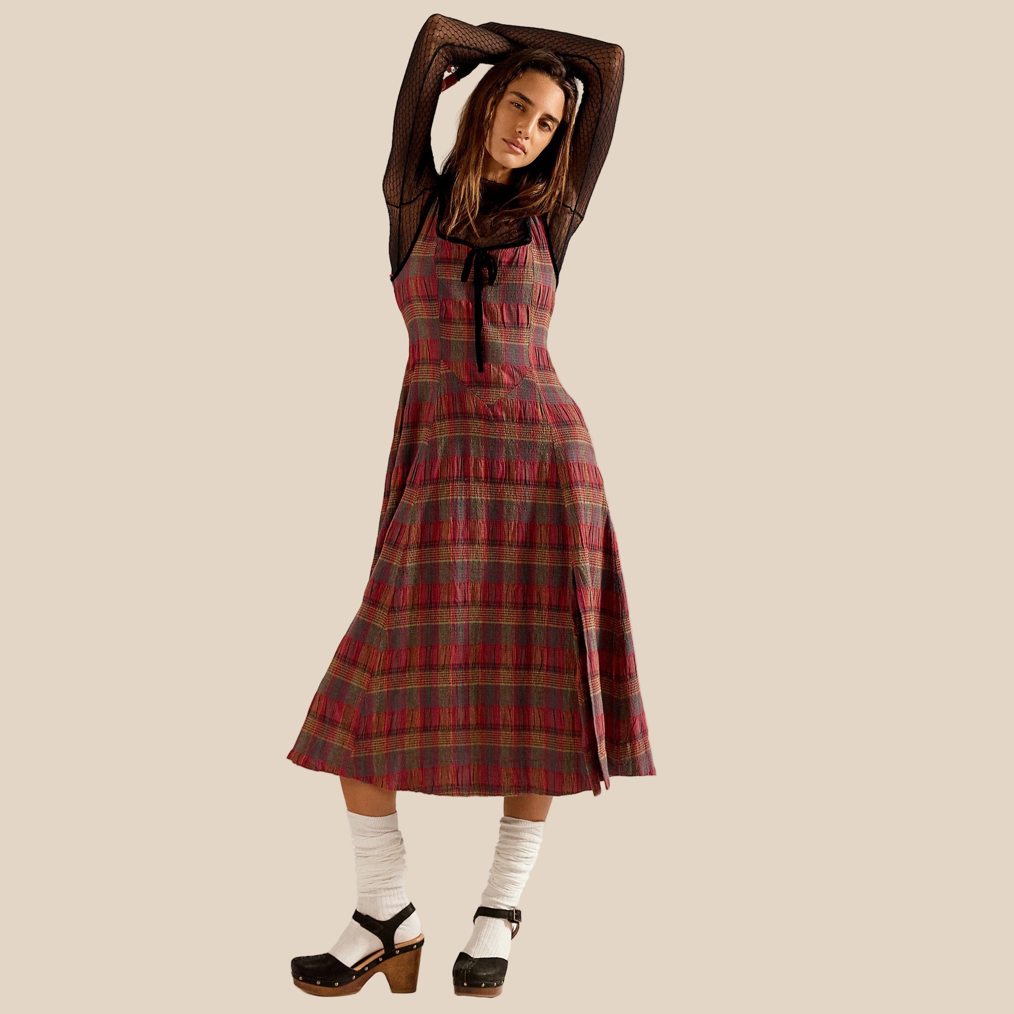 A red and multi colored plaid midi dress with a zipper back. 