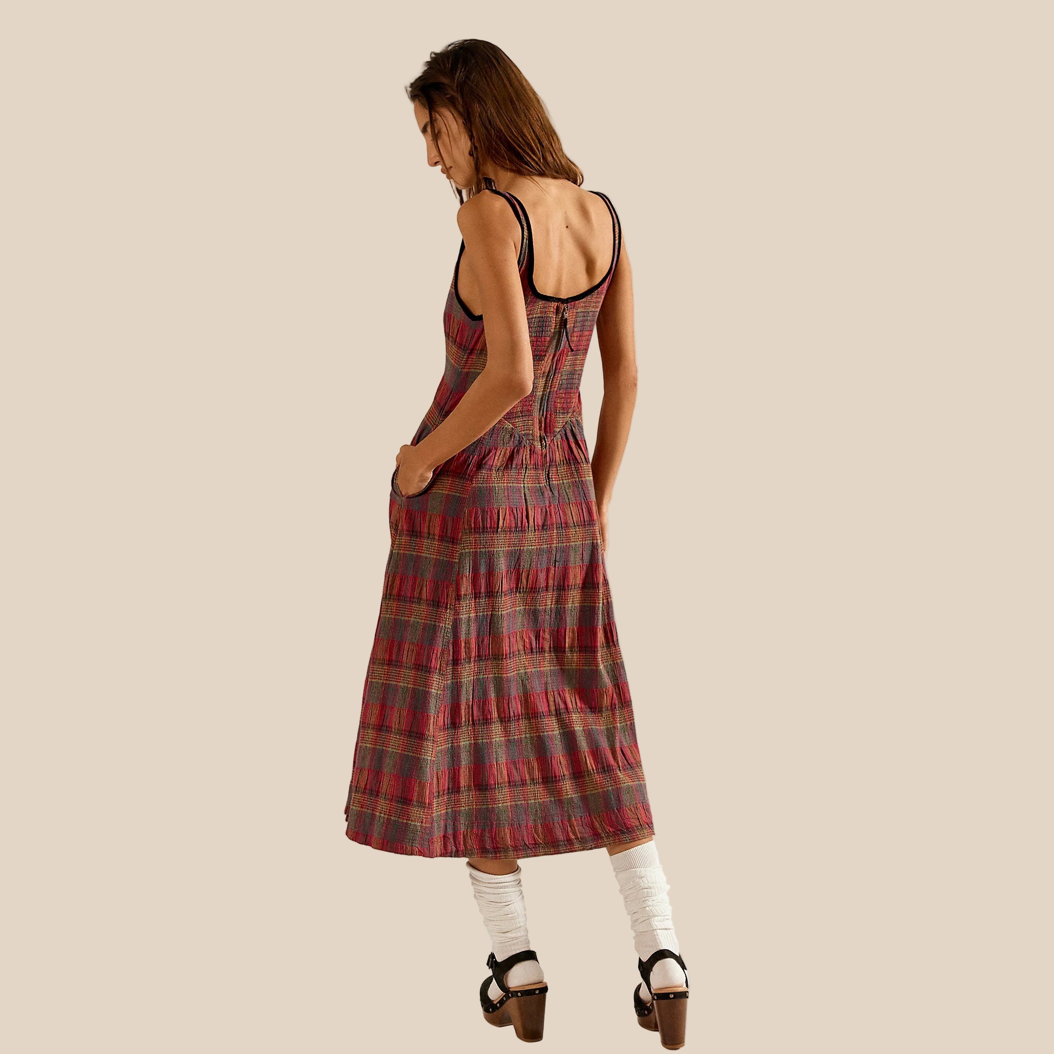 A red and multi colored plaid midi dress with a zipper back. 