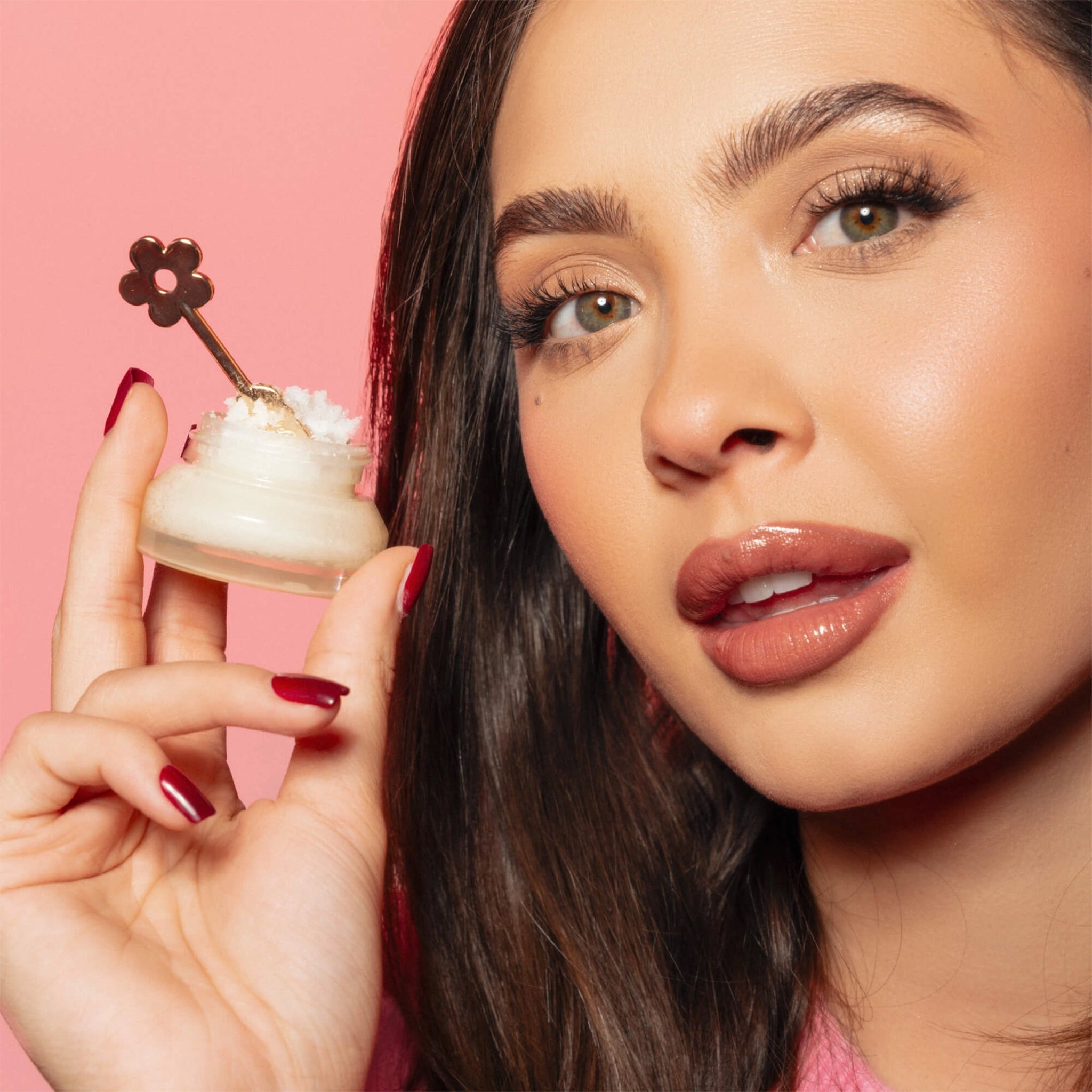 A small pot of lip scrub. 