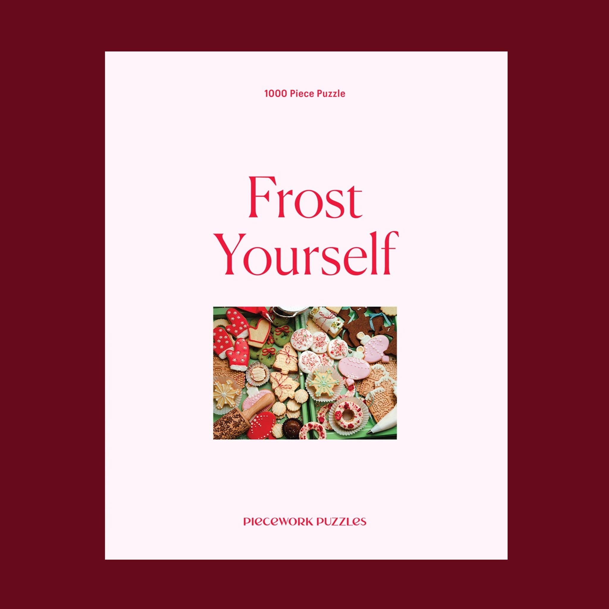 A puzzle box with a frosted cookie image and text that reads, "Frost Yourself Piecework Puzzles".