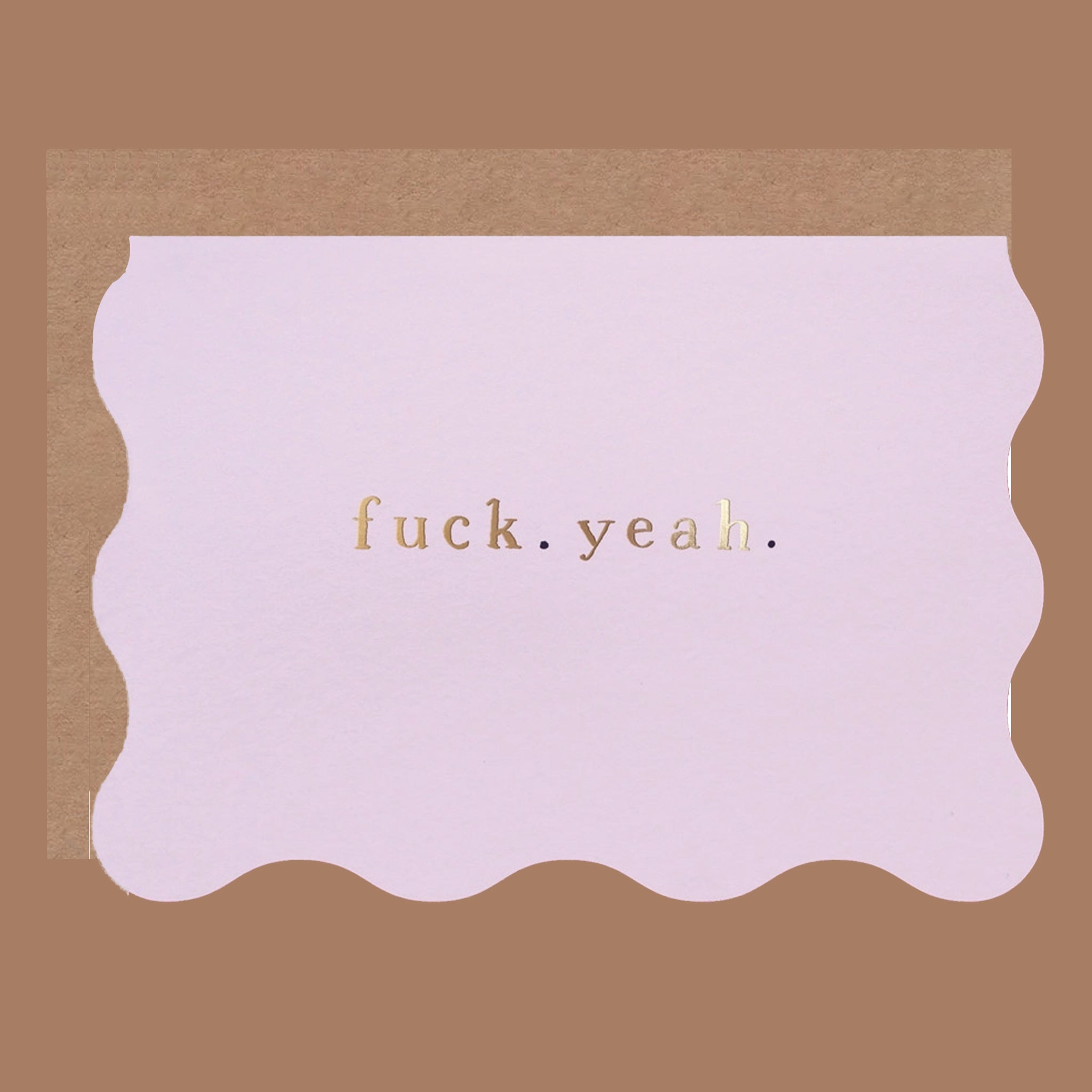 a wavy card with gold foiled text that reads, &quot;fuck. yeah.&quot;. 
