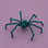 A teal spider halloween decoration. 