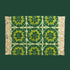 A green patterned bath mat with fringe edges. 
