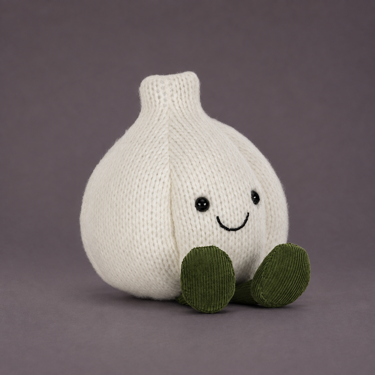 a garlic shaped plush toy. 