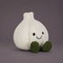 a garlic shaped plush toy. 