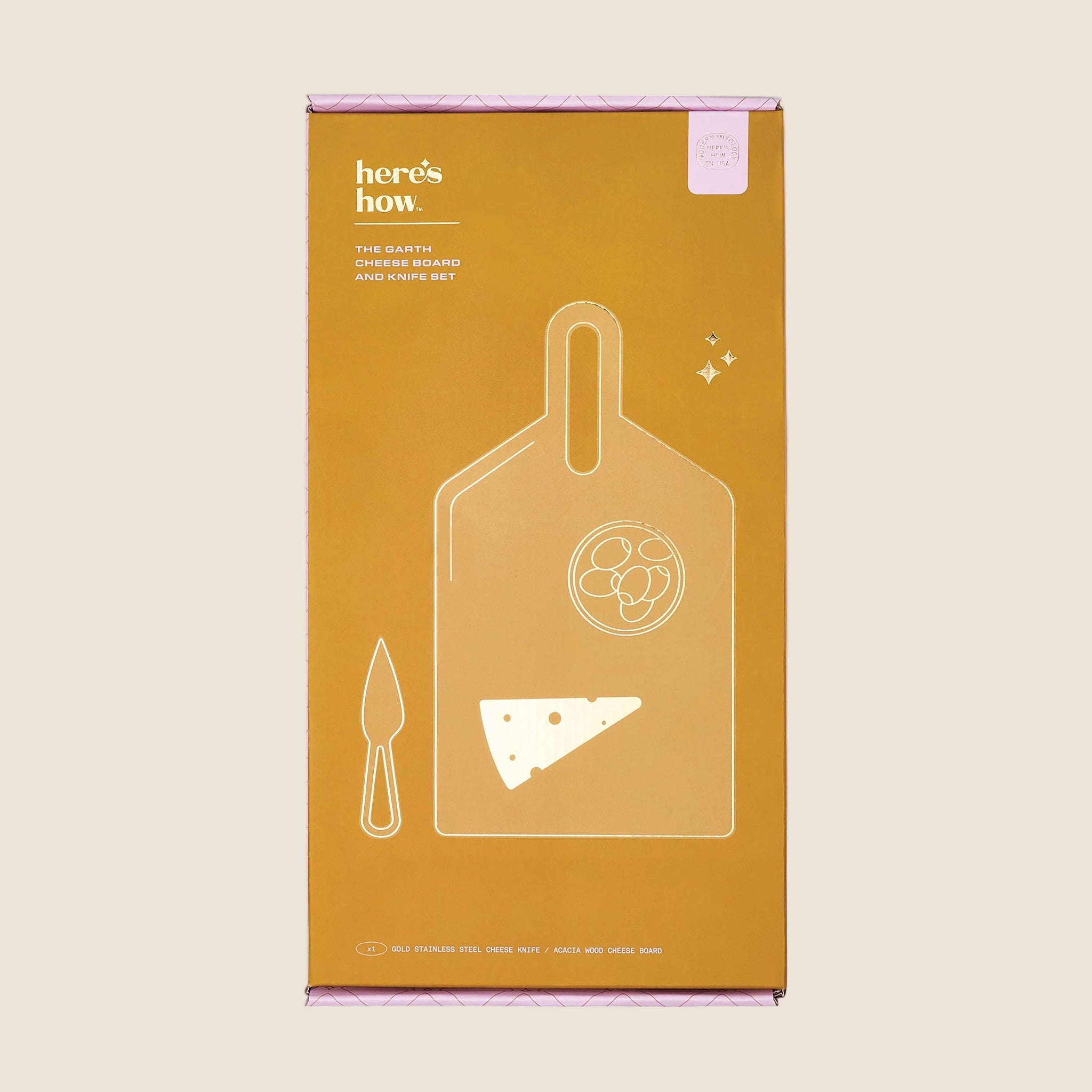 A wood cutting board / cheese board and a gold knife. 