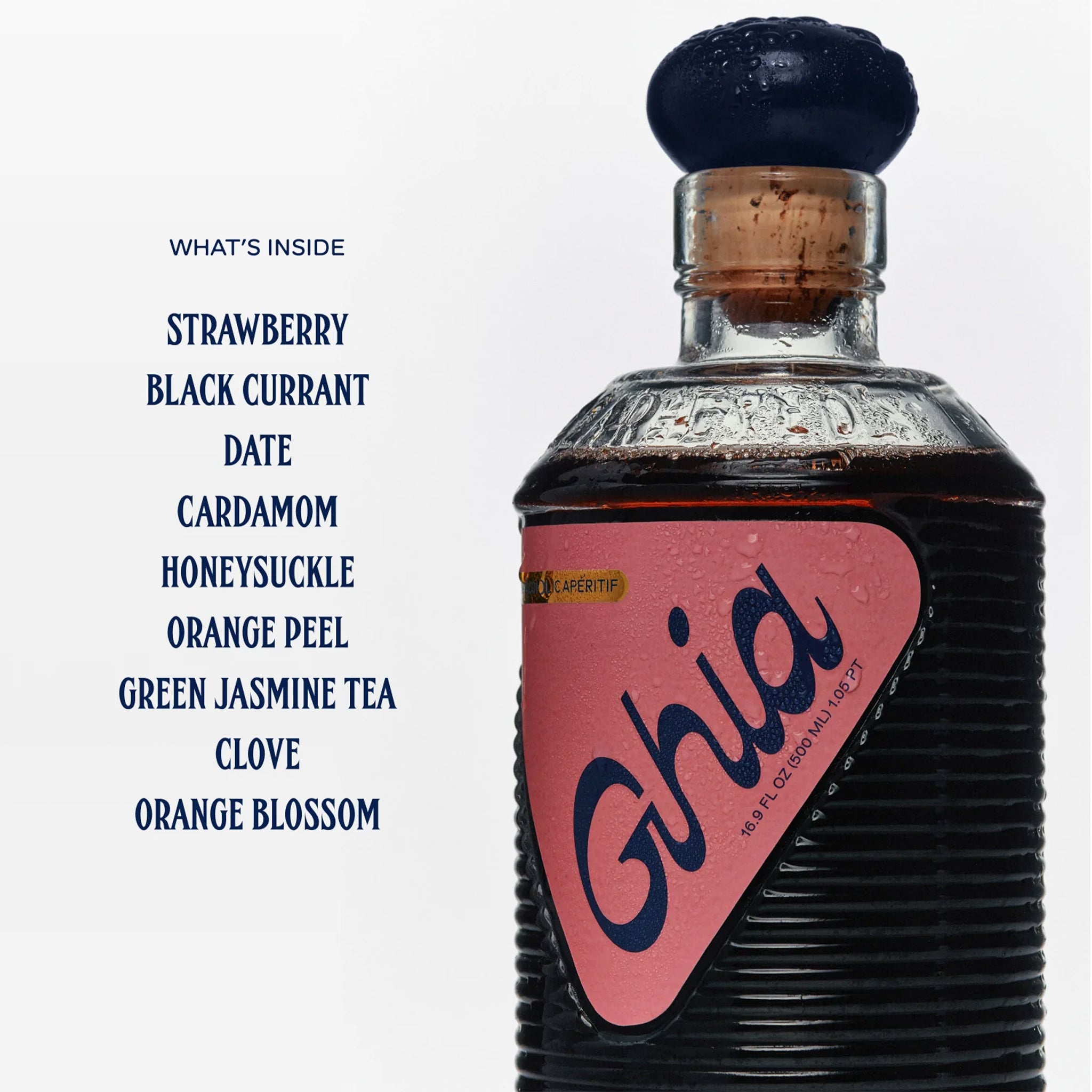 A bottle of berry flavored apertif with a label that reads, &quot;Ghia&quot;. 