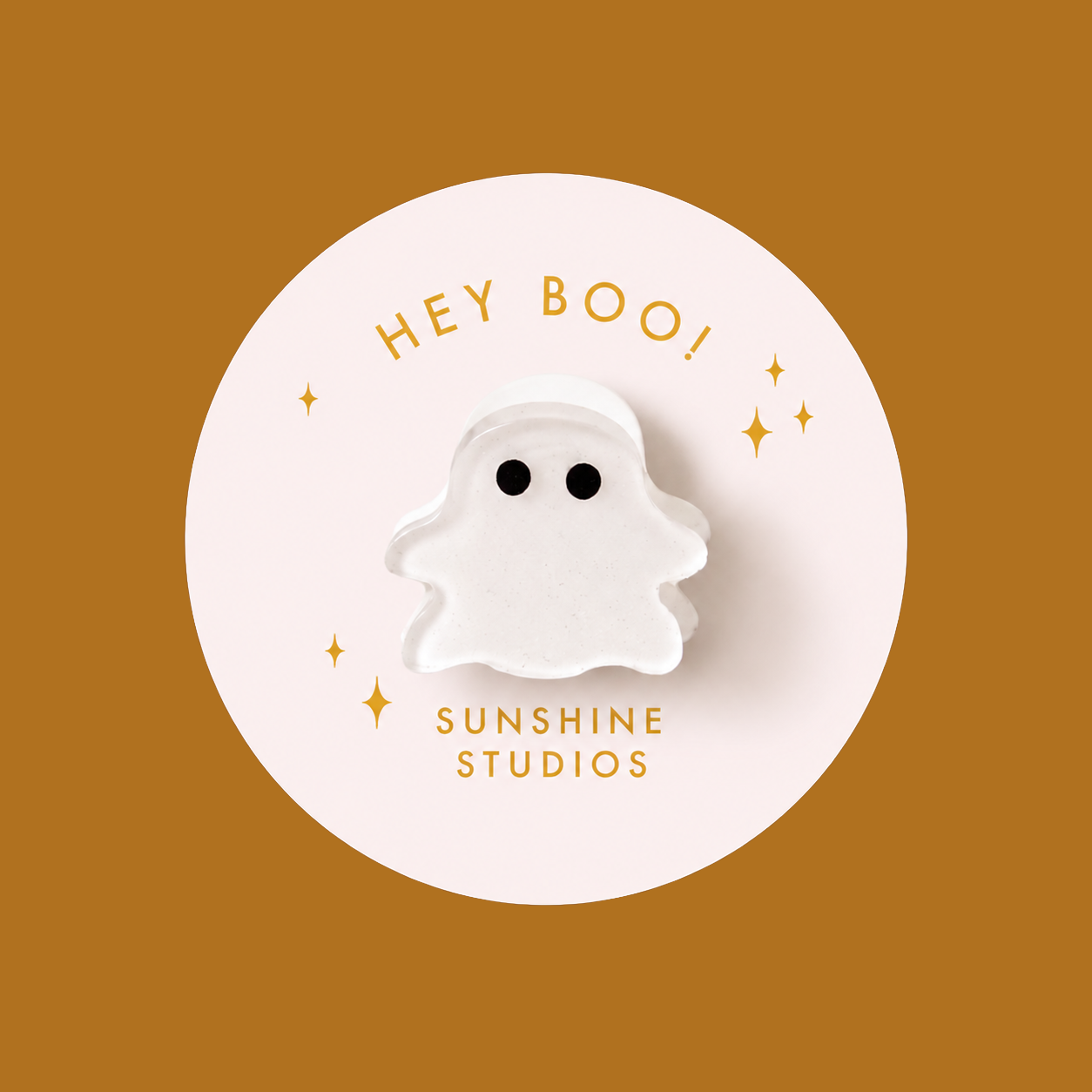 A mini white ghost shaped hair clip. 