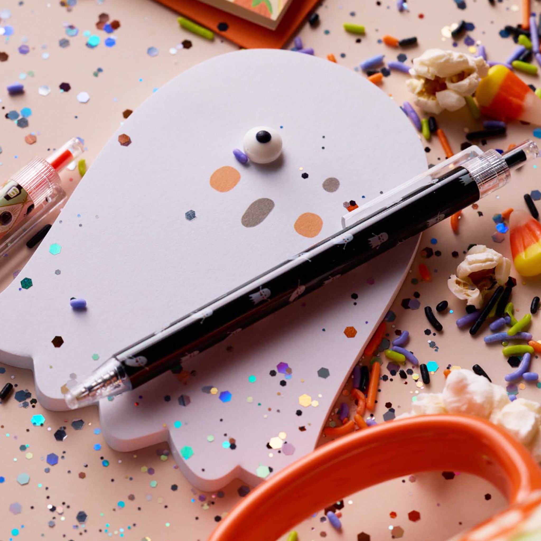 A pack of white ghost shaped sticky notes. 