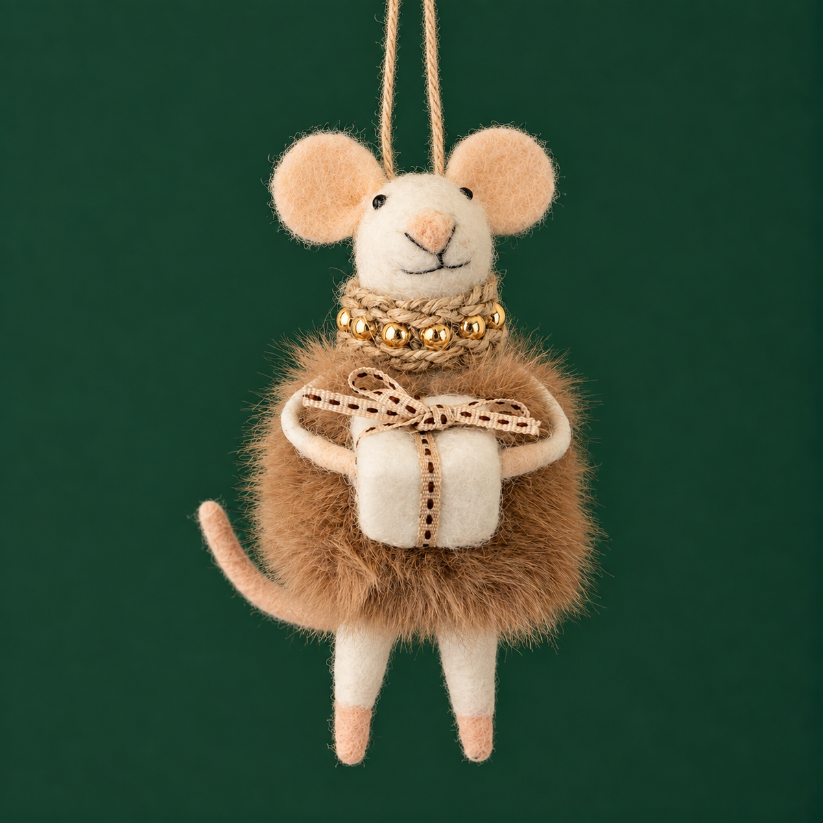 A felted mouse ornament wearing a fluffy sweater. 