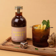 A ginger mule cocktail mix inside of a glass bottle.