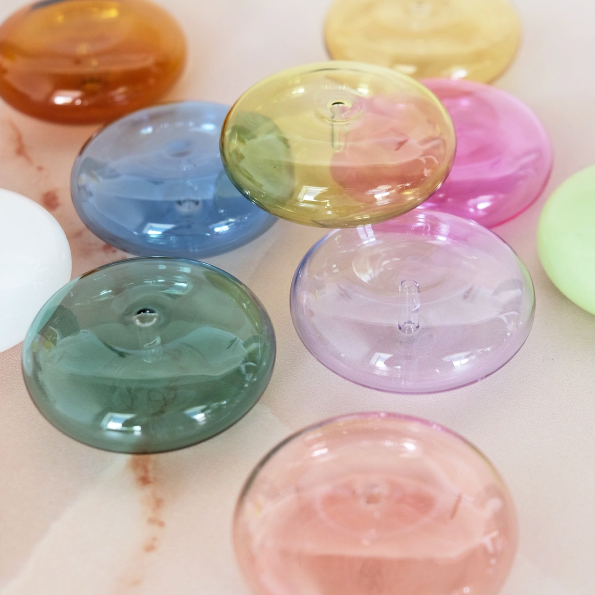 An assortment of bubble shaped incense holders.