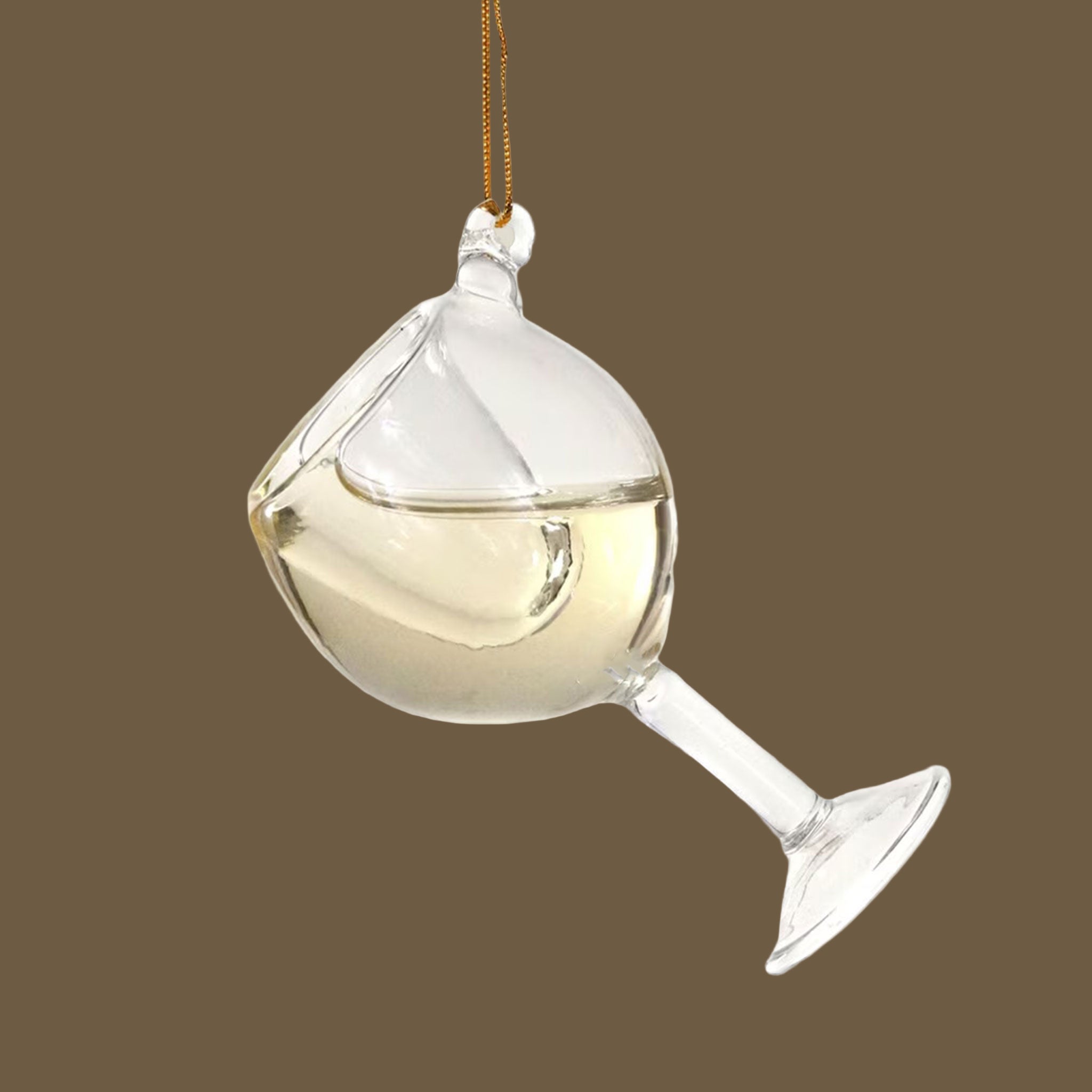 Glass of white wine ornament, contains a champagne colored liquid inside the glass. 