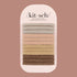 A stack of neutral elastic hair ties with a glitter finish. The colors range from a neutral tans, brown, and grey. 