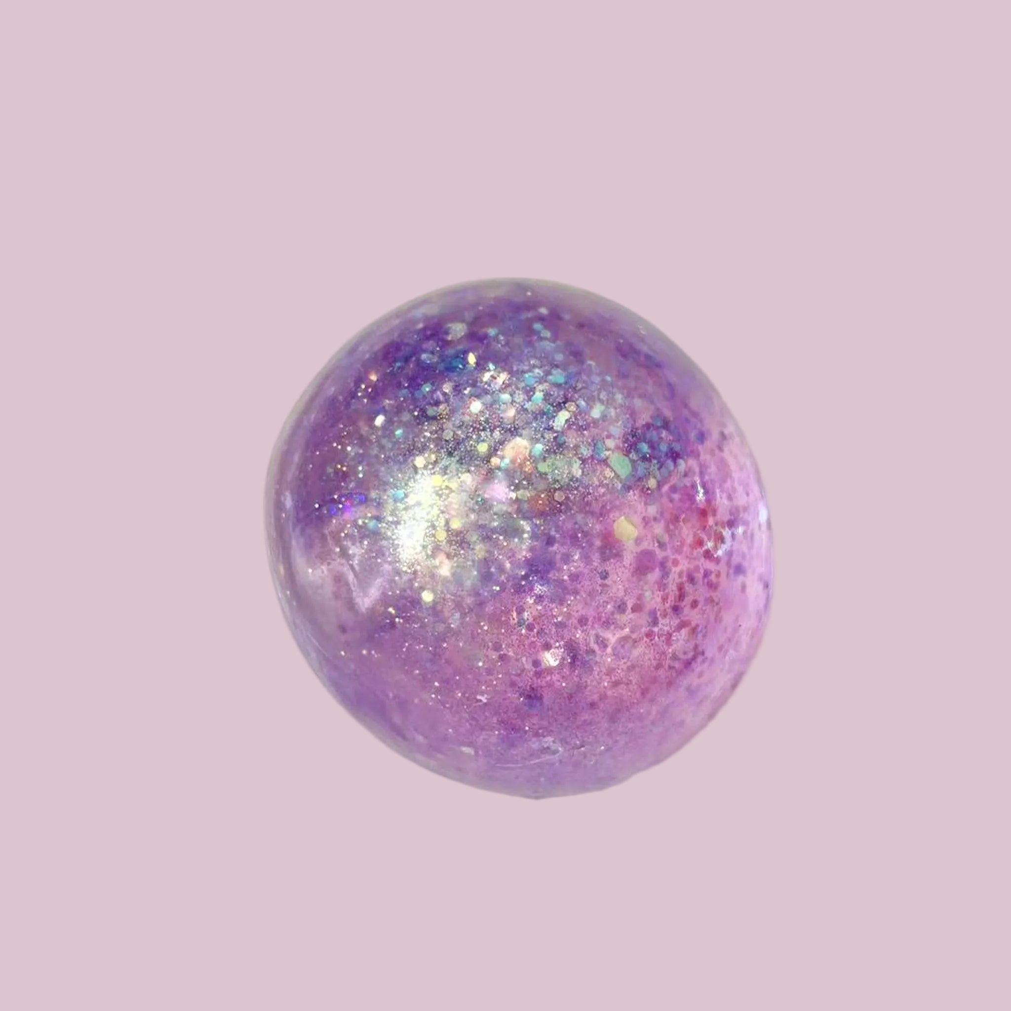 Purple glitter squish ball. 