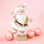 A gold glitter Santa figurine. 