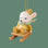 Mouse ornament with white fur, gold clothes and teal accents. The mouse is sitting on a wooden sled. 