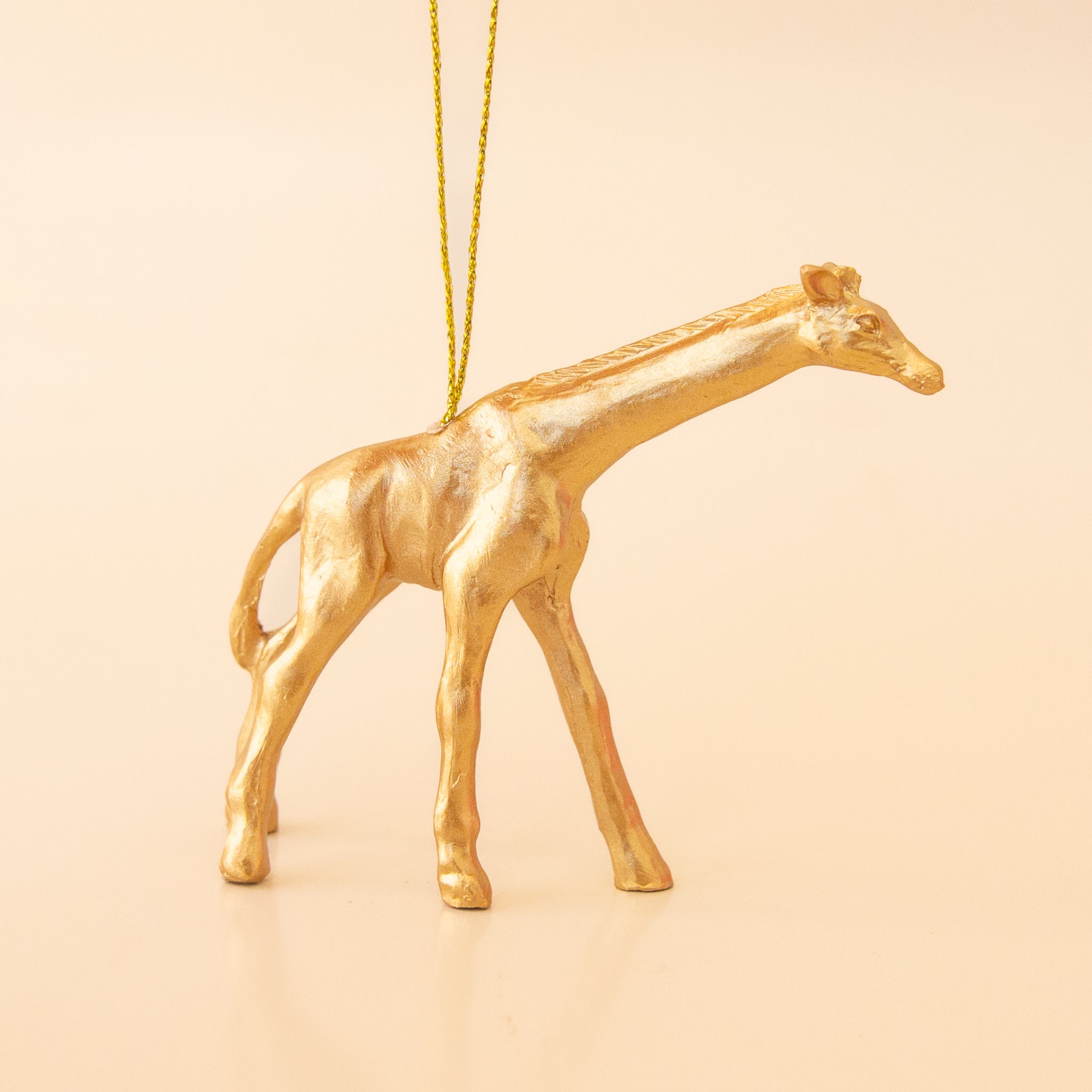 Gold giraffe ornament. 