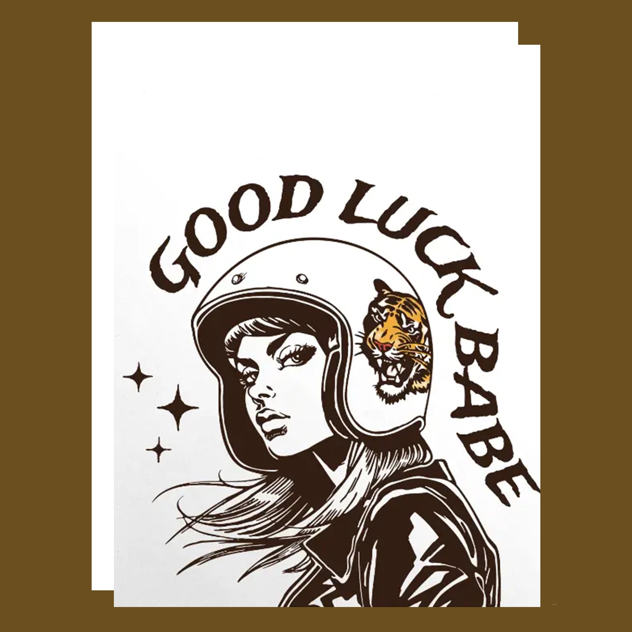 A white card with a black drawing of a girl wearing a helmet with a tiger on the side and text that reads, "Good Luck Babe". 