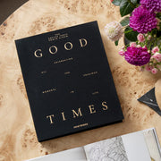 A black photo album cover with gold foiled text that reads, 'Good TImes'. 