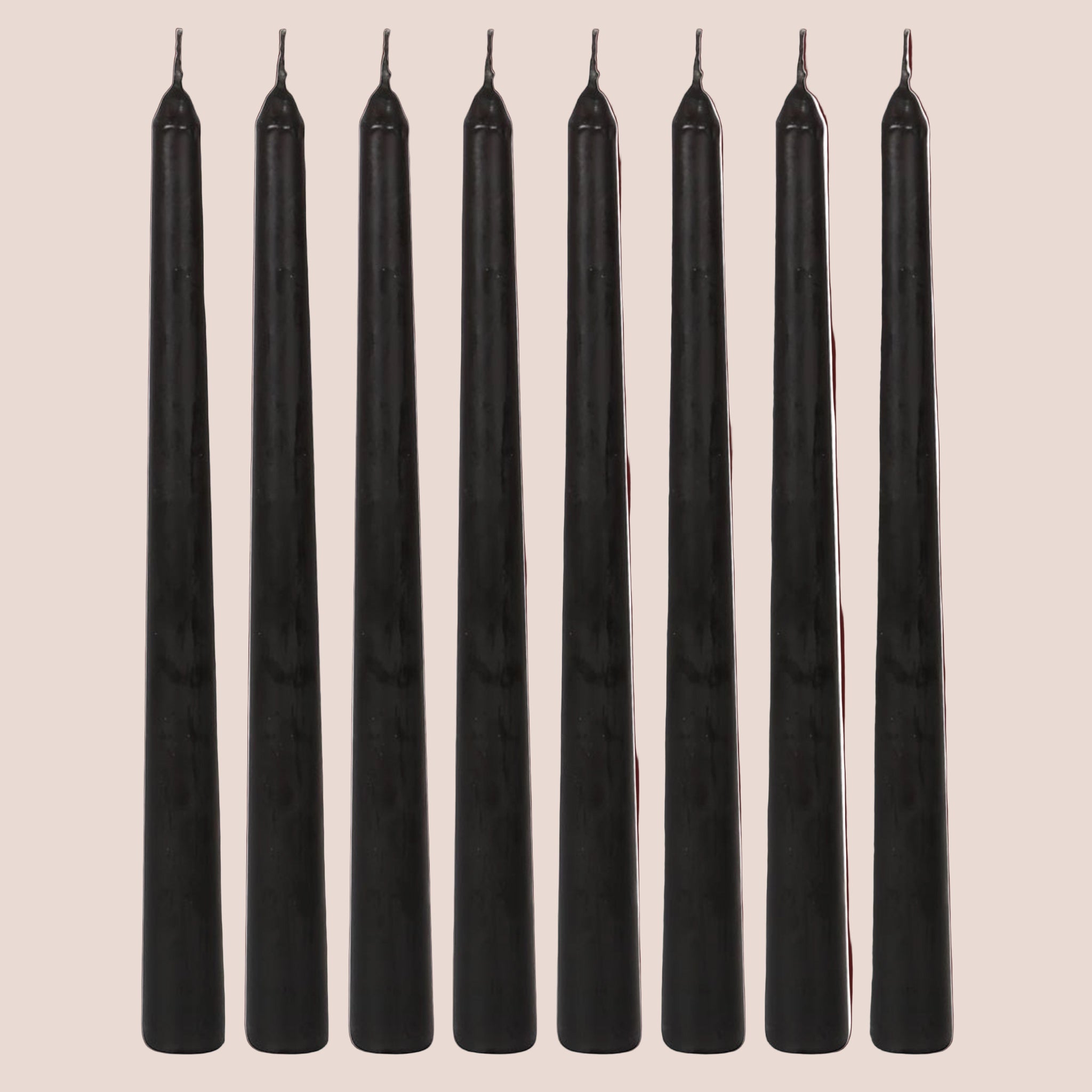 A set of black taper candles.