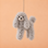 a grey poodle shaped ornament. 
