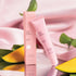 A light pink tube of guava mango lip treatment. 