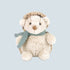 A neutral hedgehog shaped stuffed animal toy with a light teal colored scarf around its neck. 