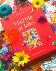 A red boxed puzzle with a colorful jello image and design and the title that reads, 'Had Me at Jello Piecework Puzzles'. 