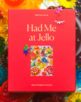 A red boxed puzzle with a colorful jello image and design and the title that reads, 'Had Me at Jello Piecework Puzzles'. 