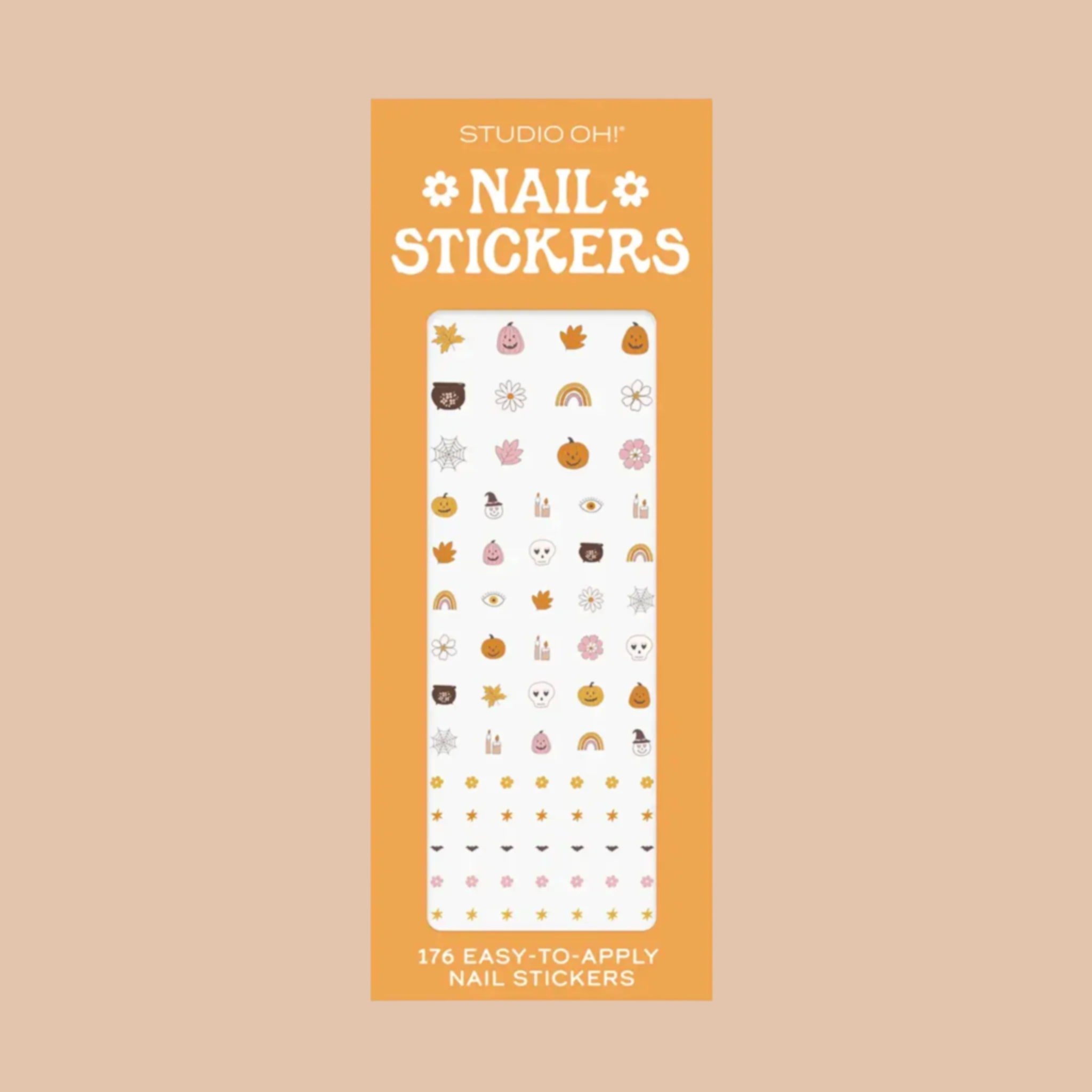 An orange packaging filled with Halloween themed stickers with text that reads, 'Studio Oh Nail Stickers'.
