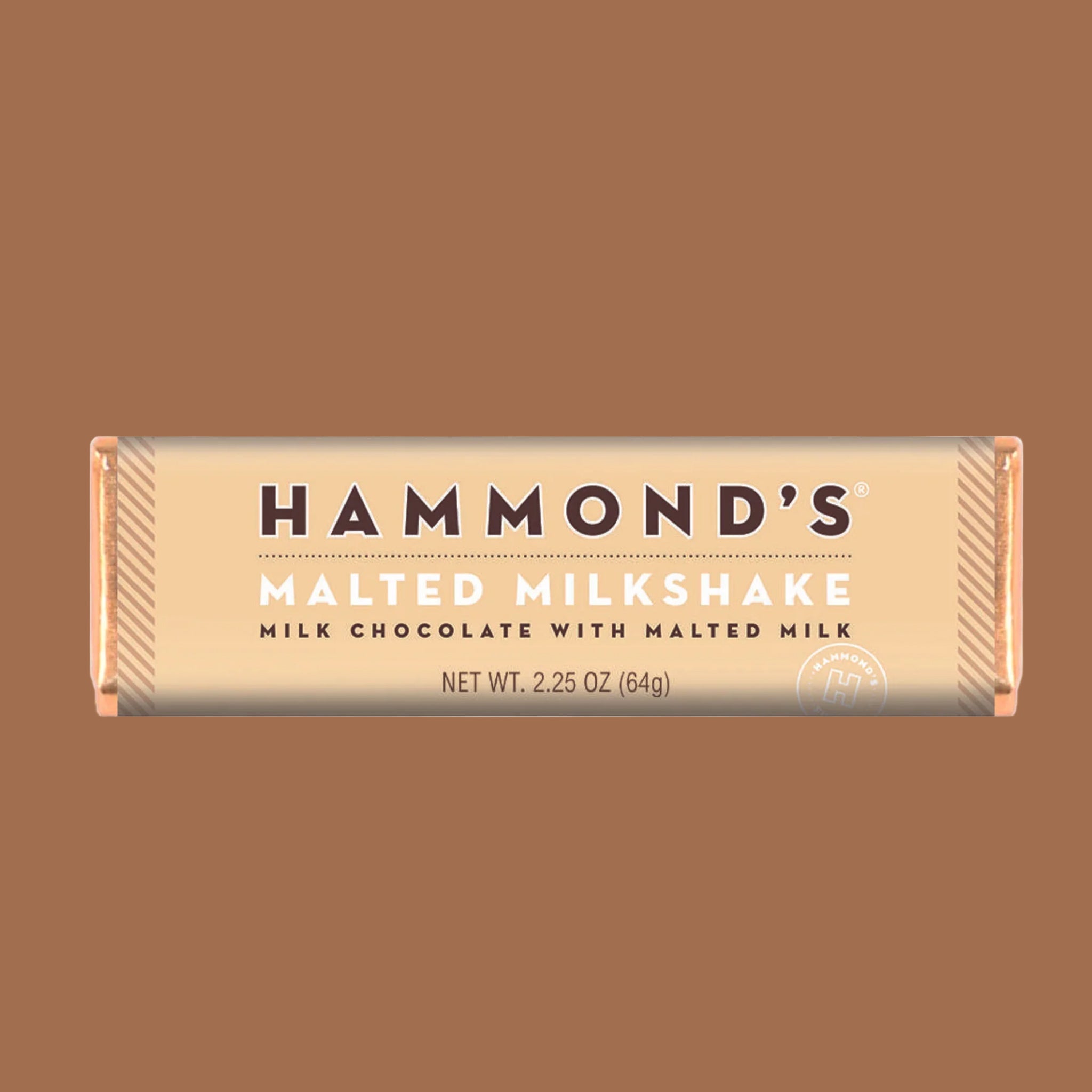 A chocolate bar that reads, 'Hammond's Malted Milkshake Milk Chocolate With Malted Milk'. 