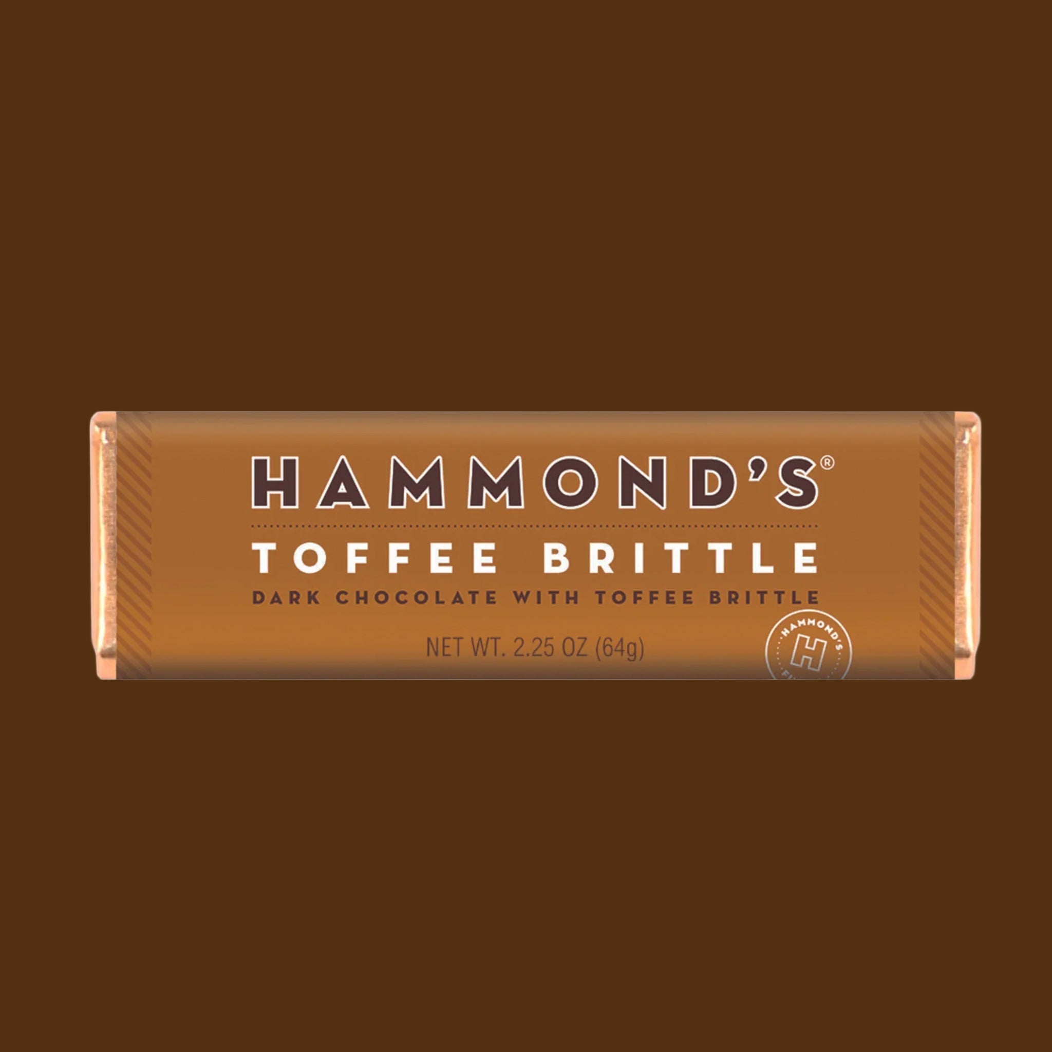 A brown bar of chocolate that reads, 'Hammond's Toffee Brittle Dark Chocolate With Toffee Brittle'. 