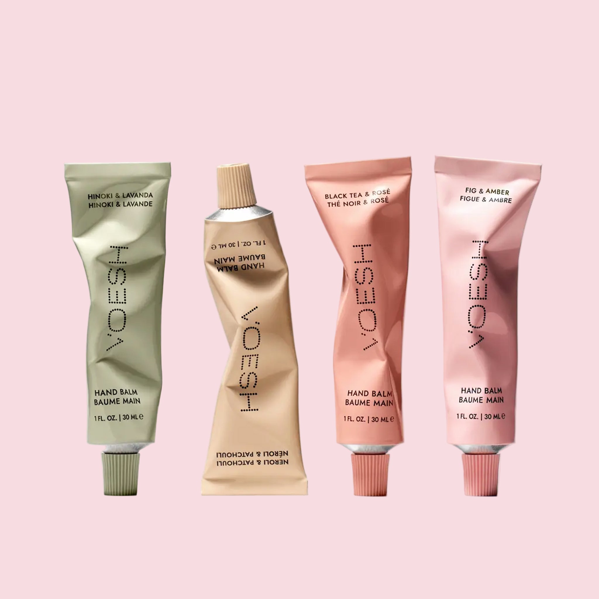 A set of four hand balm tubes. 