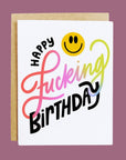card that reads "happy fucking birthday" with a smiley face