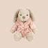 A bunny shaped stuffed animal toy wearing a light pink robe. 