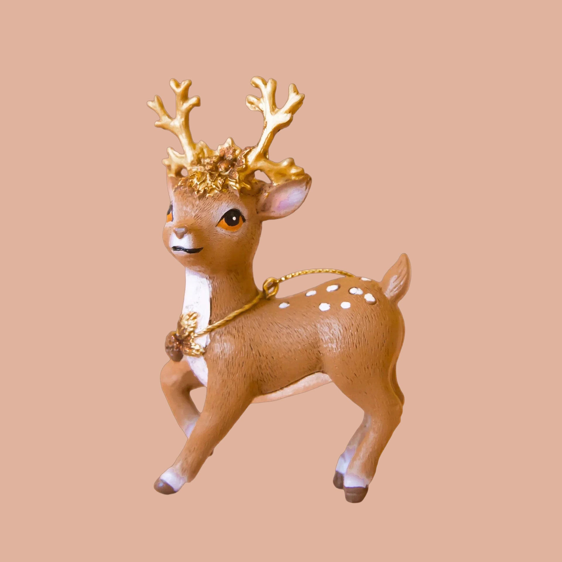 A brown ornament in the shape of a reindeer. 