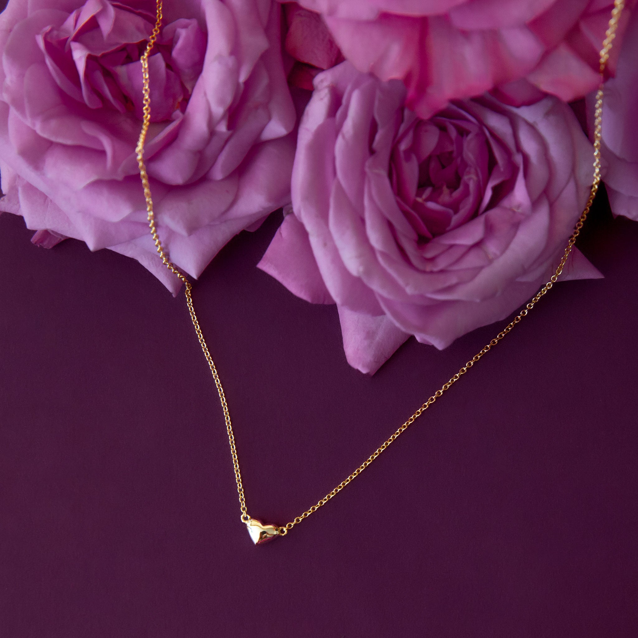 A bubble heart pendant necklace. 