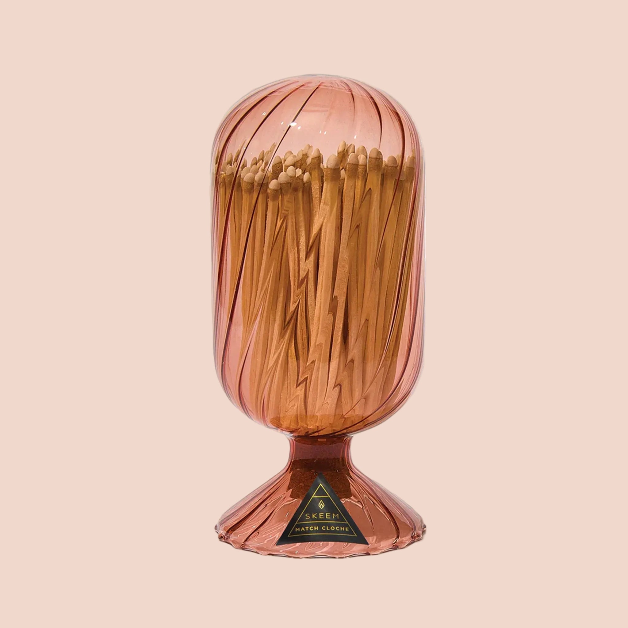 A match cloche in a peachy toned glass. 