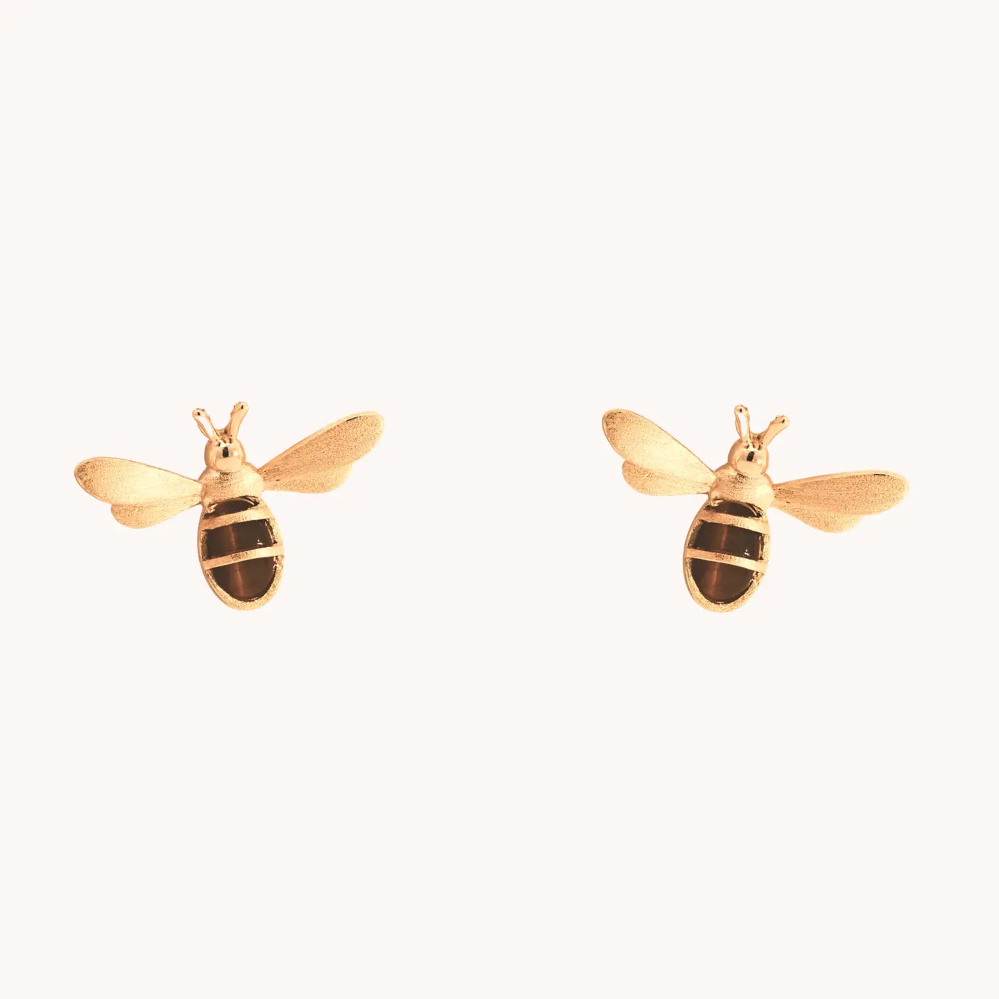 A pair of honeybee shaped stud earrings. 