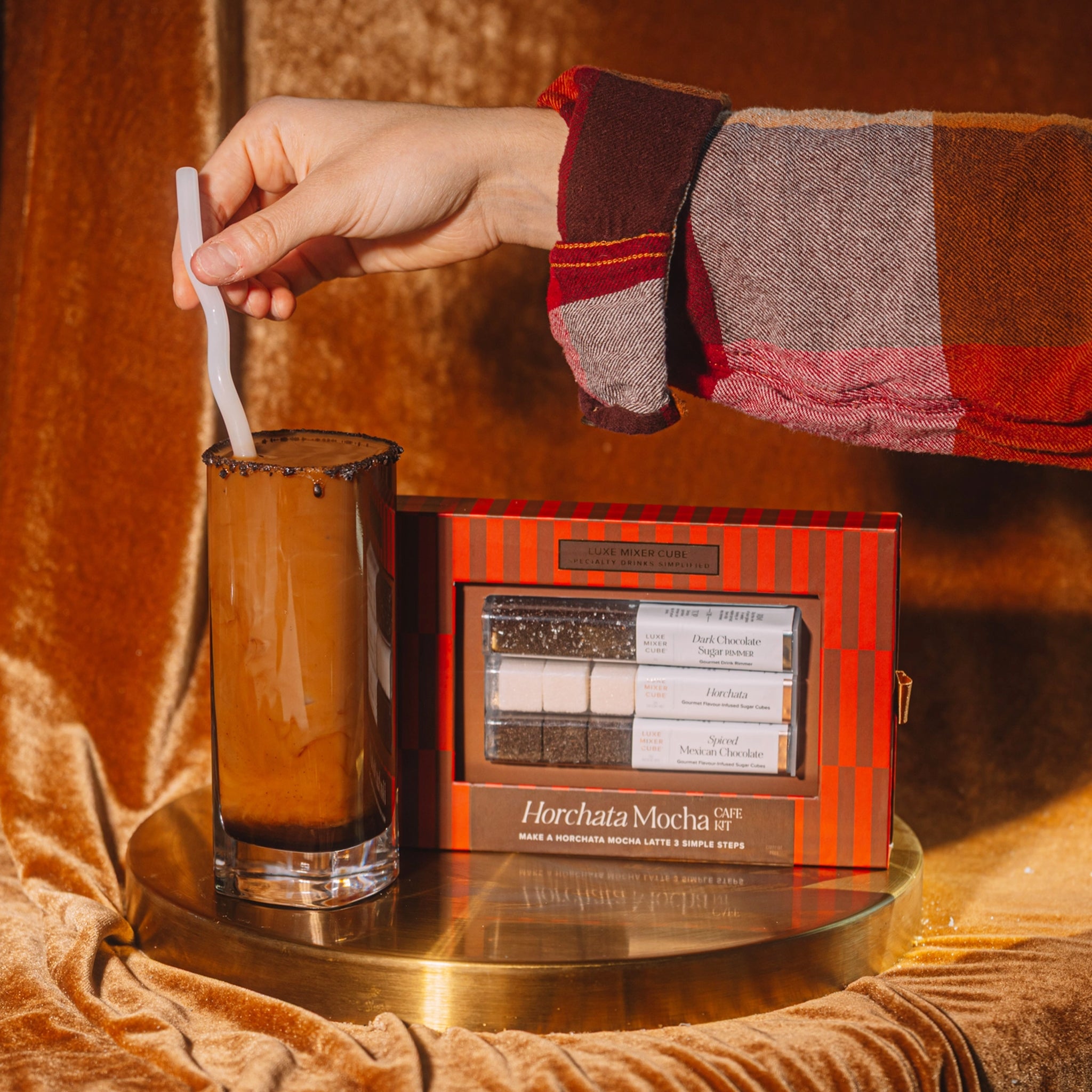 A red and brown box of mocha flavored sugar cubes. 