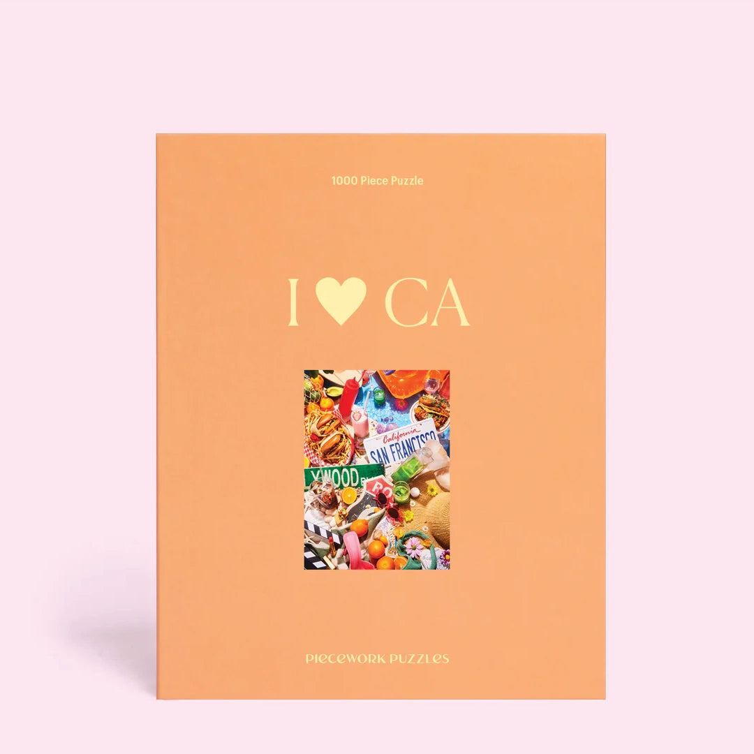 A puzzle box with the title, "I <3 CA" that has images of the iconic state of California including, green juices, sunglasses, animal style burgers and fries, tacos, a Hollywood street sign and more.