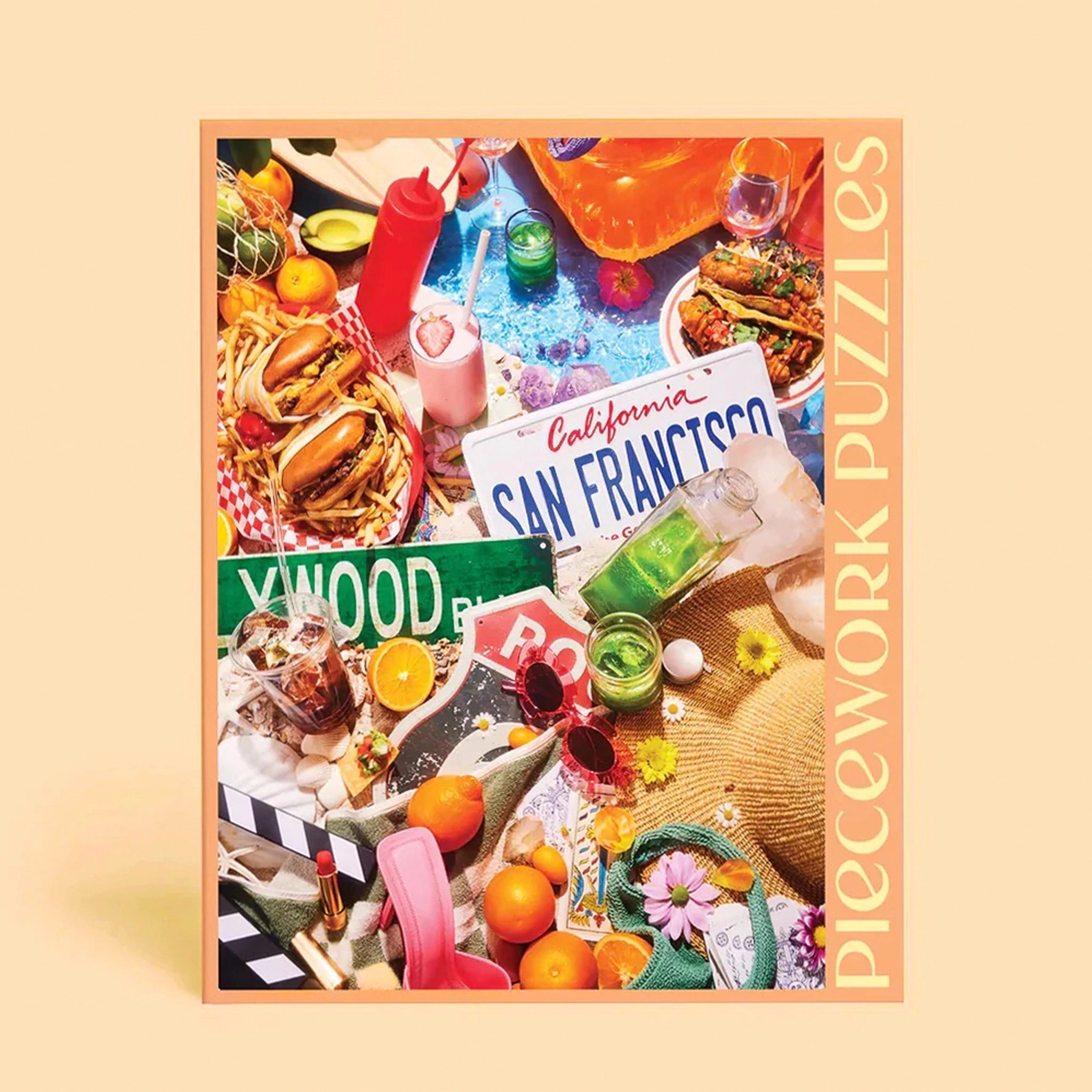 On a light orange background is a puzzle box that has images of the iconic state of California including, green juices, sunglasses, animal style burgers and fries, tacos, a Hollywood street sign and more.