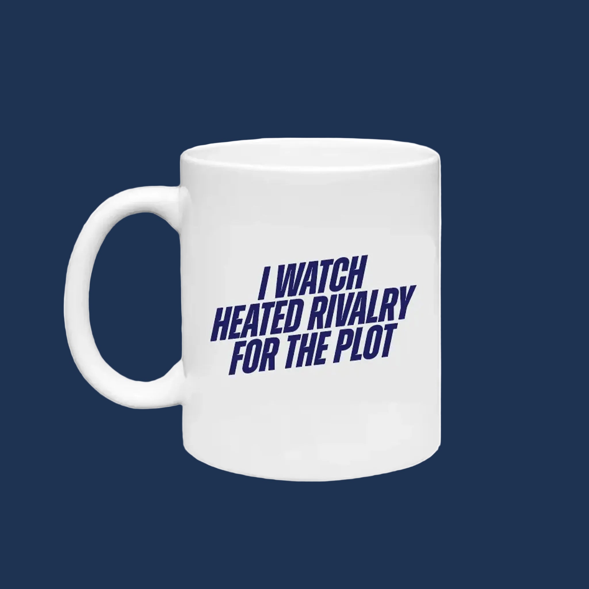 A white mug that reads "I watch heated rivalry for the plot" on one side and "The plot" with a collage of the actors from the show Heated Rivalry on the other. 