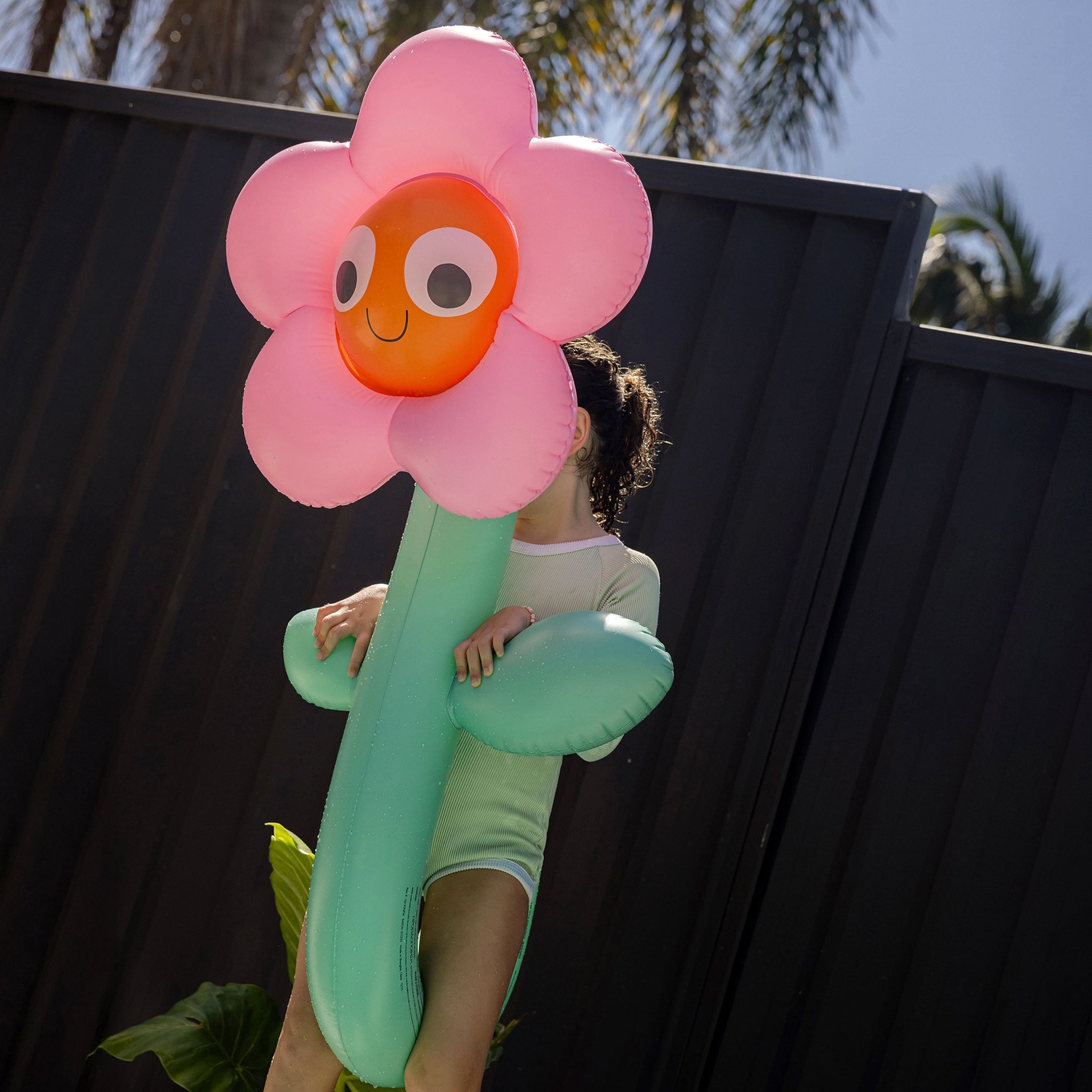 inflatable pool float in a flower shape. 