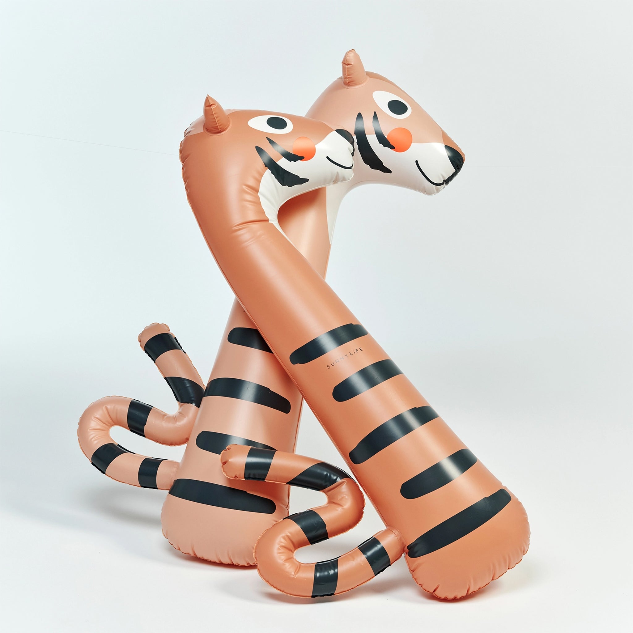 A set of two orange tiger pool floats. 