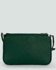 backside view of a deep green crossbody bag