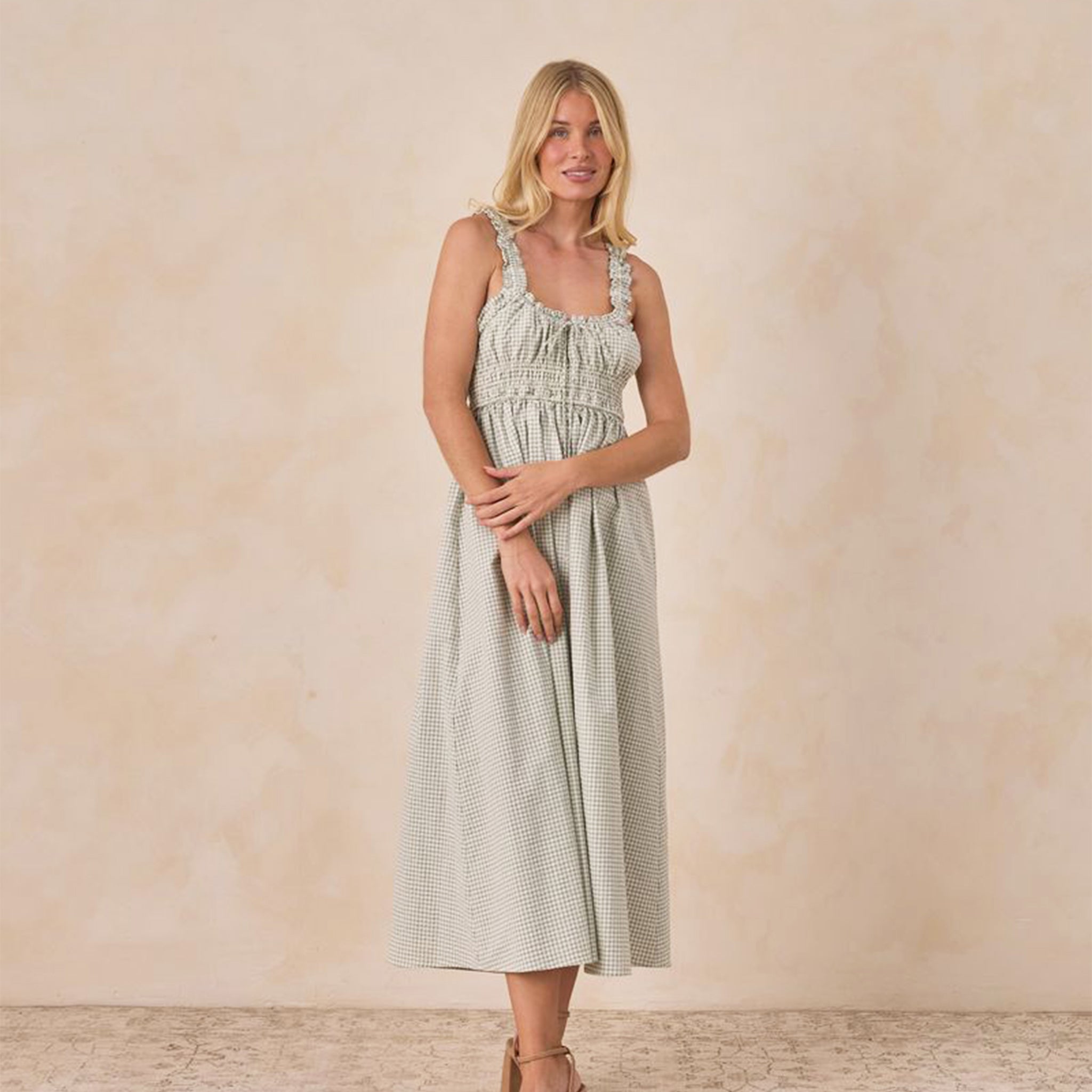 A light green and cream checkered dress. 