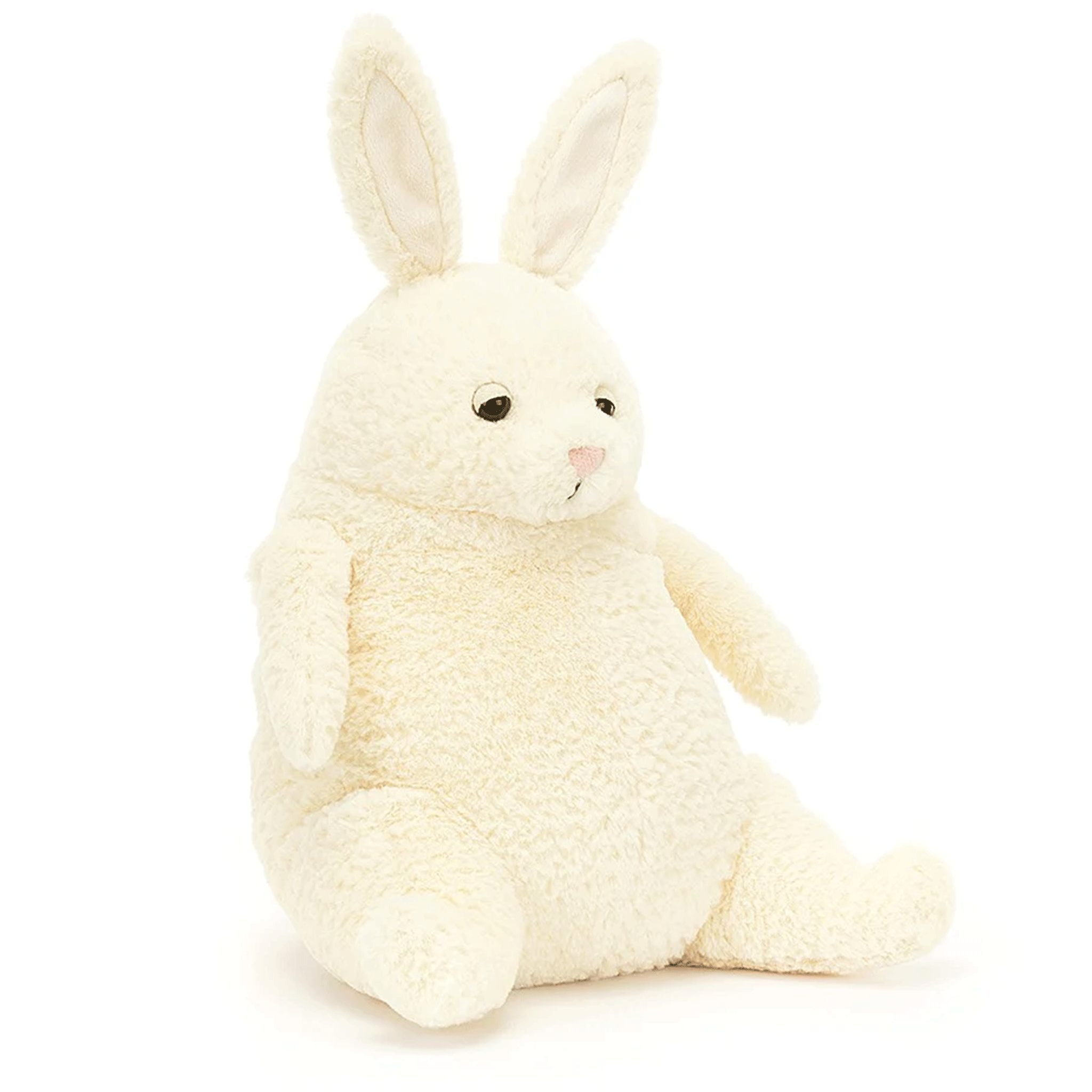 On a white background is a cream colored bunny stuffed toy with long ears and a cuddly body. 