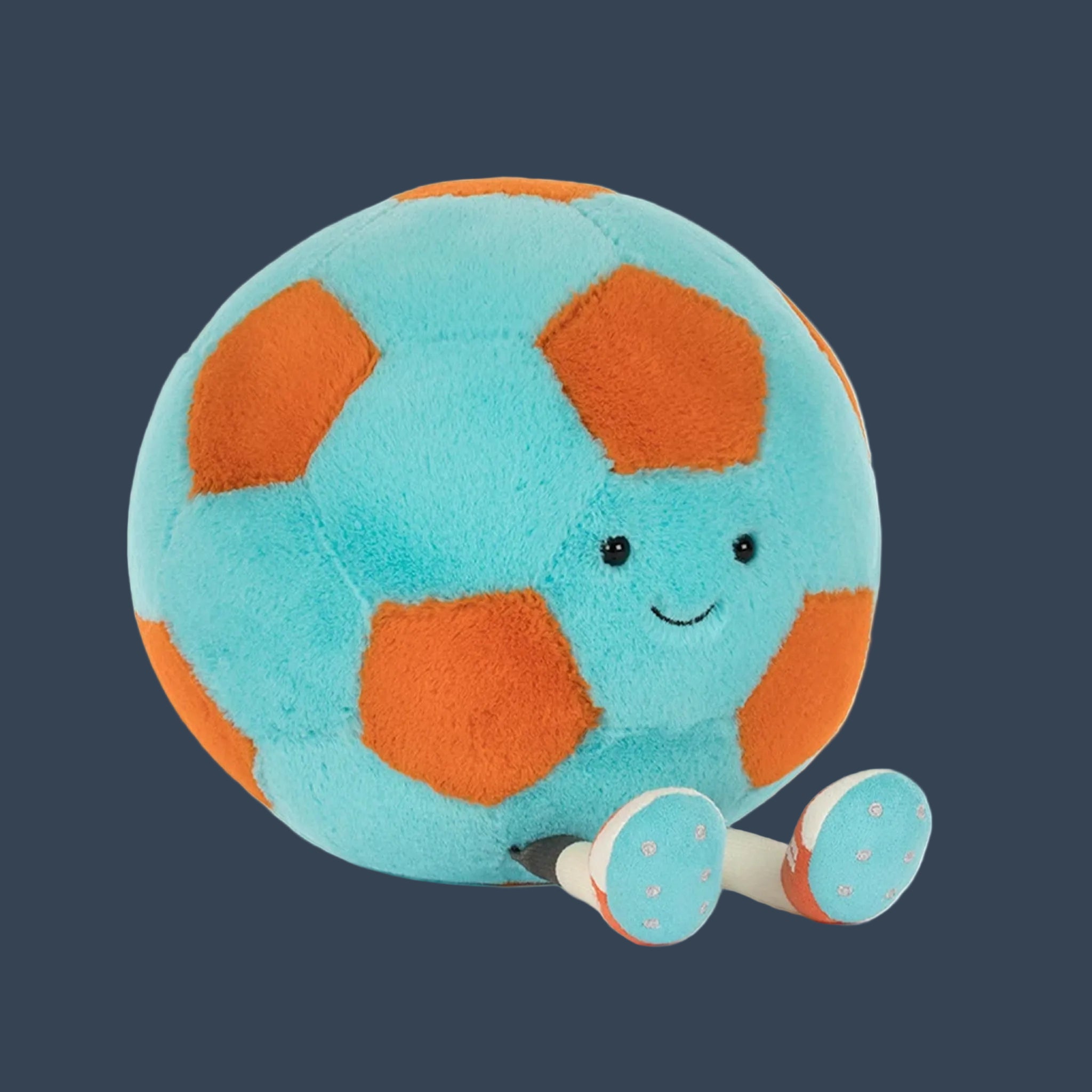 plush toy soccer ball orange and teal. 